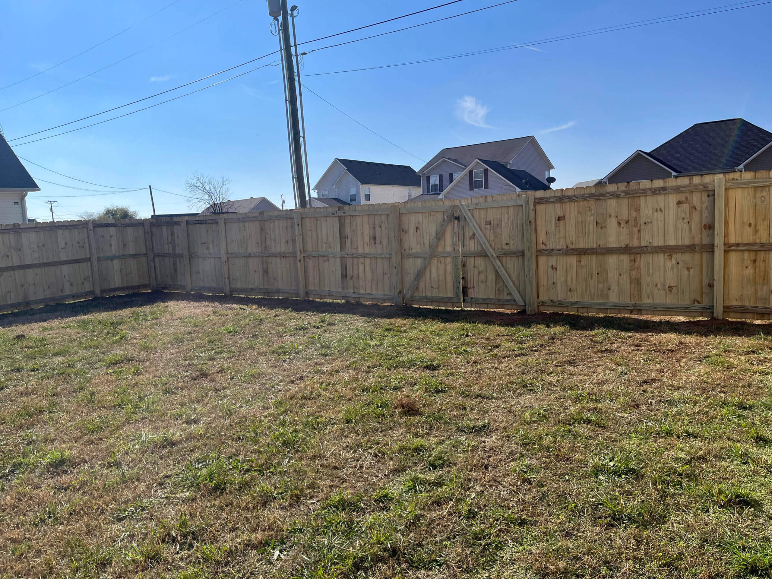 Residential Wood Fence Installation by TM Exterior Solutions | Fence Company